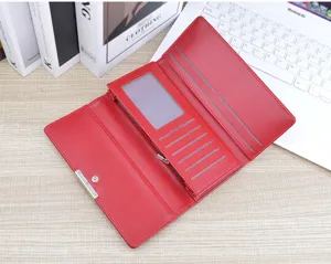 Red long women's wallet, soft leather multi-card holder tri-fold clutch bag interior detail view.