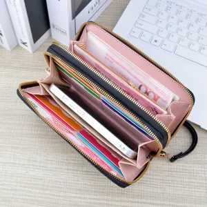 Women's long double zipper wallet large capacity black leather clutch purse with phone pocket.
