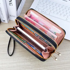 Women's long double zipper wallet large capacity PU leather clutch purse with multiple card slots.