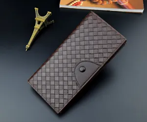 Detail view of men's long vintage woven leather wallet featuring large capacity and card slots.