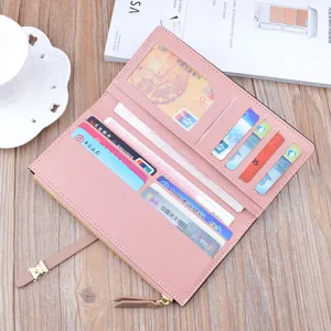 Pink long women's wallet, stylish soft leather purse with multiple card slots and zipper closure.