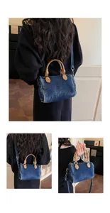 Vintage washed denim boston bag for women, casual commuter handbag with shoulder strap.