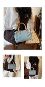 Retro casual wash denim boston handbag for women, versatile chic shoulder and crossbody bag.