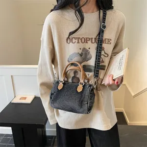 Vintage washed denim boston bag for women, commuter shoulder handbag and crossbody bag.