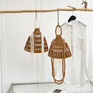 Borsa a mano in legno intrecciato con catene di perle, stile foresta borsa di paglia vuota per donne.