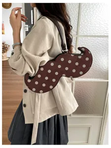 Chic irregular polka dot shoulder bag, trendy niche design underarm handbag for women.