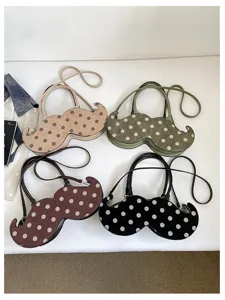 Trendy mustache shaped polka dot shoulder bag, chic commuter handbag for women style.