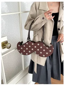 Niche design polka dot novelty handbag women's stylish shoulder underarm bag unique shape.