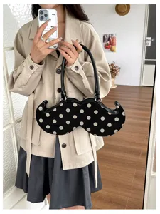 Unique mustache polka dot handbag detail, stylish PU leather shoulder bag for women commuting.