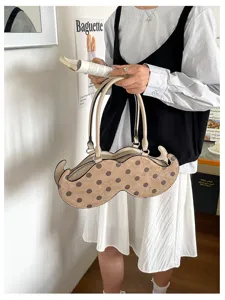 Unique mustache shaped handbag with cute polka dots, stylish ins style shoulder bag for women.