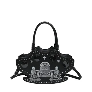 Gothic punk skull handbag with tombstone graphic print and metal studs for daily fashion.