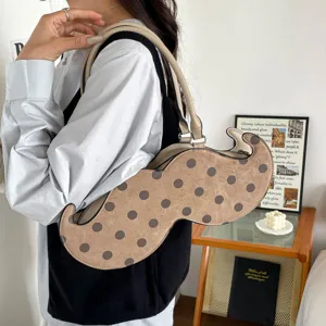 Ins style irregular polka dot shoulder underarm bag unique niche design commuter handbag for women