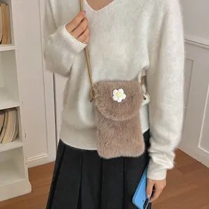 Fluffy mini cross-body phone bag with cute daisy, trendy plush shoulder bag for daily casual outfit.