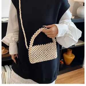 Moda estiva borsa a mano artigianale in perline di legno, borsa a tracolla da spiaggia.
