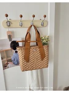 Vintage geweven stro handtas voor dames, stijlvolle lederen handtas voor zomer strandvakantie.