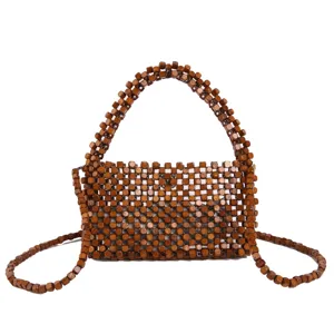 Borsa a mano con perline di legno da donna, borsa da spiaggia intrecciata vintage design cavo.