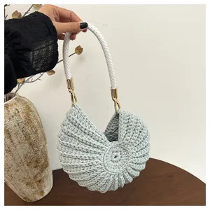 Handmade crochet seashell handbag, stylish knitted beach shoulder bag for women chic design.