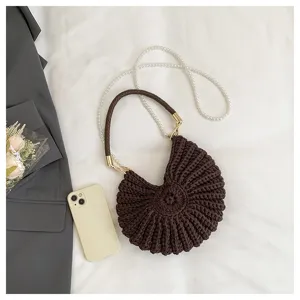 Chic brown woven seashell conch shoulder bag with pearl chain, stylish crossbody bag.