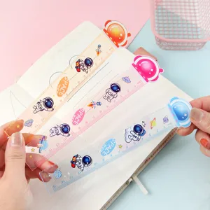 Cute 15cm transparent plastic ruler with cartoon astronaut design for students and stationery.