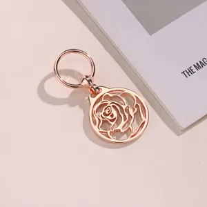 Exquisite rose gold hollow flower scarf buckle bag pendant stylish metal accessory detail view