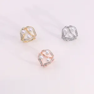 Geometric rhinestone pearl scarf ring variant, elegant multi-ring hijab clip accessory.