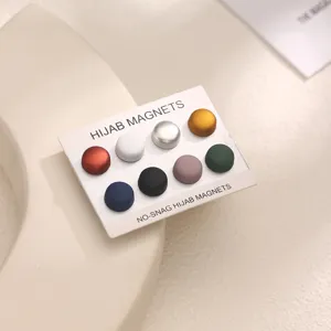 Colorful round hijab magnets set with backing card, perfect for secure and stylish scarf styling.