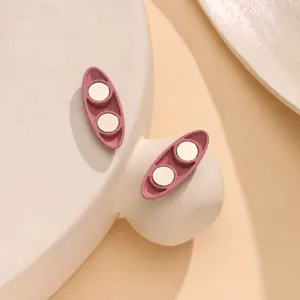 Clips magnetiche ovali rosa per hijab e sciarpe, design sicuro e durevole per uso quotidiano.