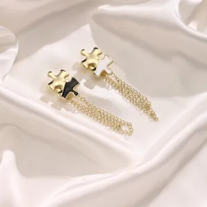 Magnetic pants hem shortening clips with chains, stylish metal puzzle design for clothes adjustment.