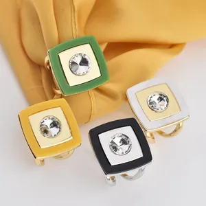 Square acrylic scarf ring set detail showcasing multi-color elegant rhinestone accessories.