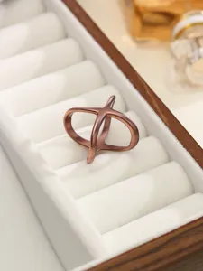 Elegant X-shaped metal scarf buckle and fashion ring, matte rose gold finish for versatile styling.