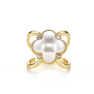 Retro gold four-leaf clover scarf ring with white pearl and rhinestones for elegant women.