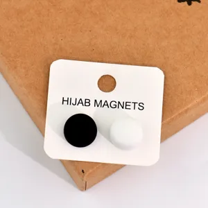 Round magnetic hijab pins in black and white, seamless anti-glare scarf clips for women.