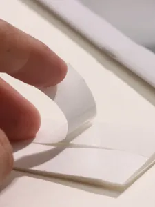 Invisible double-sided clothing tape for anti-slip collar security and wardrobe fixing.
