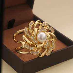 Elegant gold-tone flower rhinestone pearl scarf ring brooch accessory for women fashion wear.
