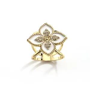 Gold-tone four-leaf clover scarf buckle with sparkling rhinestones and white enamel