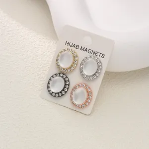 Oval cat-eye rhinestone hijab magnetic pin detail showcasing exquisite craftsmanship and sparkle.