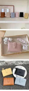 Minimalist women short wallet multi card holder fashion solid color PU leather coin purse.