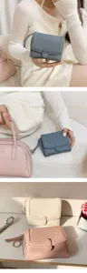 Detailansicht der minimalistischen Damen Geldbörse mit Litschi-Muster und Schlüsselmäppchen.