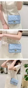 Elegante hellblaue gesteppte Kettentasche für Damen, klassisches Design Umhängetasche.
