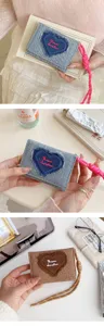 Denim trifold wallet with heart embroidery and wrist strap, trendy mini coin purse.