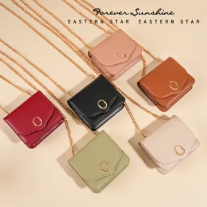 Stylish women mini crossbody bag with gold chain and round buckle, available in multiple colors.
