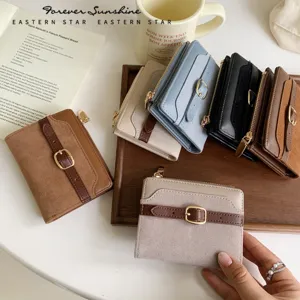 Korte dames portemonnee van suède patchwork PU leer met een elegante riemgesp