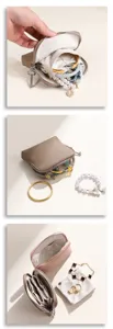 Tragbare Leder Schmucktasche mit mehreren Fächern zur praktischen Aufbewahrung von Armbändern.