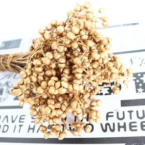 Gold dried berries bouquet Christmas floral arrangement natural plant twigs holiday decor