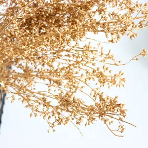 Golden dried berry branch detail, perfect for Christmas floral arrangement and home decor.