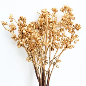 Gold berry branches floral filler for DIY home decor and Christmas wreath arrangements.