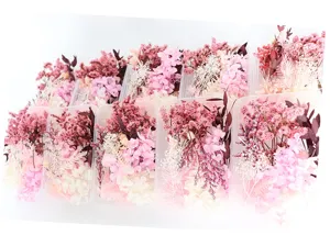Gedetailleerd overzicht van DIY gedroogde bloemen materiaal doos met roze en witte mix.
