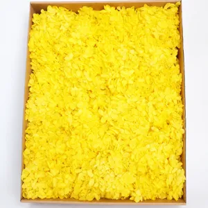 Yellow preserved hydrangea petals bulk packed in a box for DIY floral crafts aromatherapy.