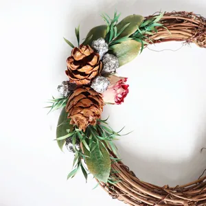 Natural pinecone twig wreath DIY Christmas floral decoration for holiday party home decor.