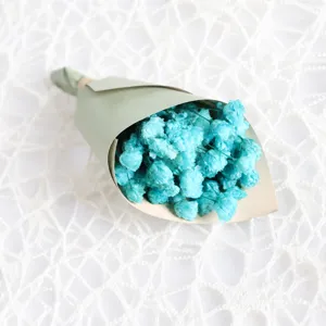Mini preserved baby's breath flower bouquet detail view, elegant blue floral gift decor.